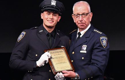 Photo of Court Officer receiving an award