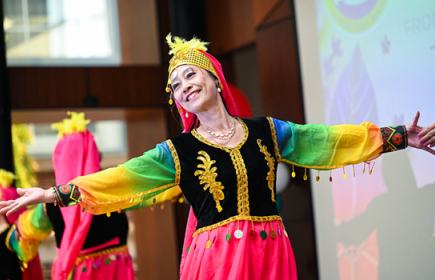 Photo of a woman wearing a brightly colored costume