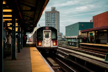 MTA 4 Train pulling into station in the Bronx
